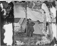 Brady-Civil-War-Photograph-Lt.-Gen.-Ulysses-S.-Grant-standing-by-a-tree-in-front-of-a-tent,-Cold-Harbor,VA.,-ca.-June-1864image-t